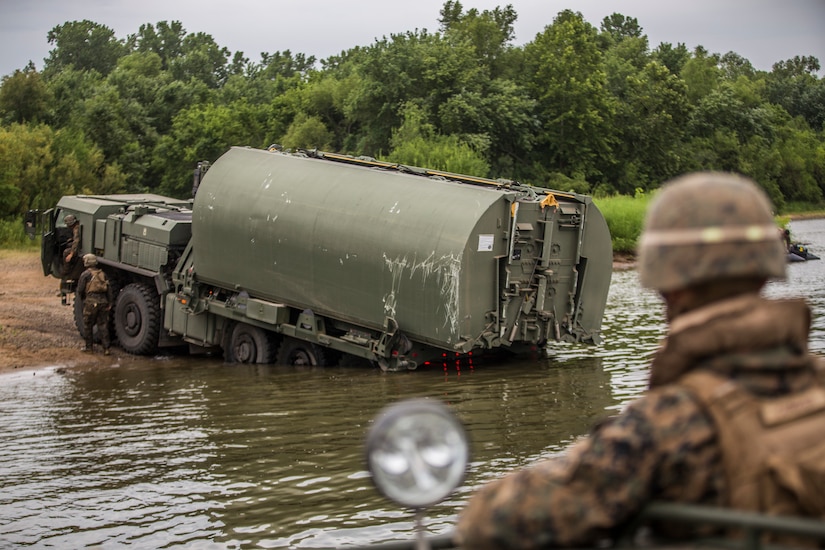 Truck fords river