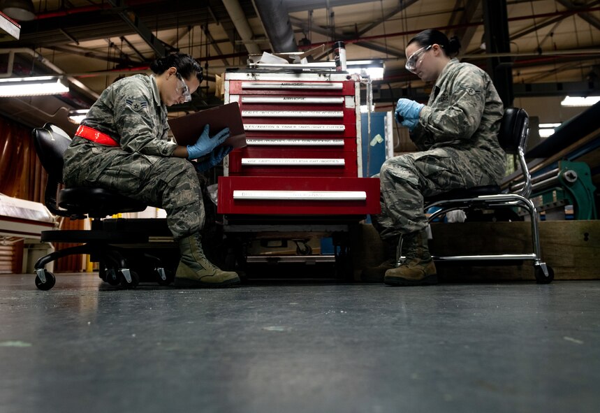 Airmen take inventory of a toolbox