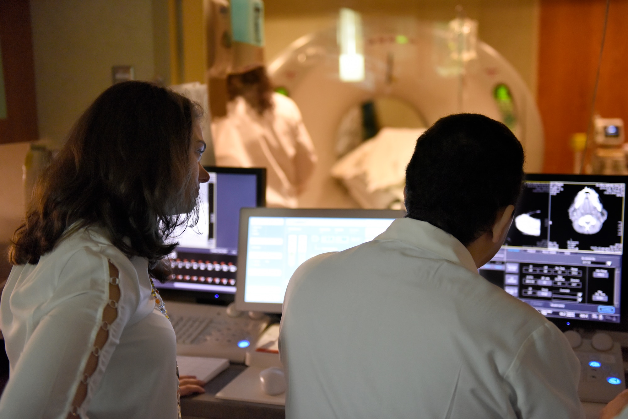 U.S. Air Force Captain Stephanie Smiddy, the infection and immunization officer-in-charge at the 180th Fighter Wing, Ohio Air National Guard, reveiws medical results, April 8, 2019, at the University of Toledo Medical Center where she works as the head research nurse for the precision oncology department at the Eleanor N. Dana Center. Smiddy provides care for patients undergoing experimental immunotherapy treatments in the research program. (U.S. Air National Guard photo by Staff Sgt. Shane Hughes)