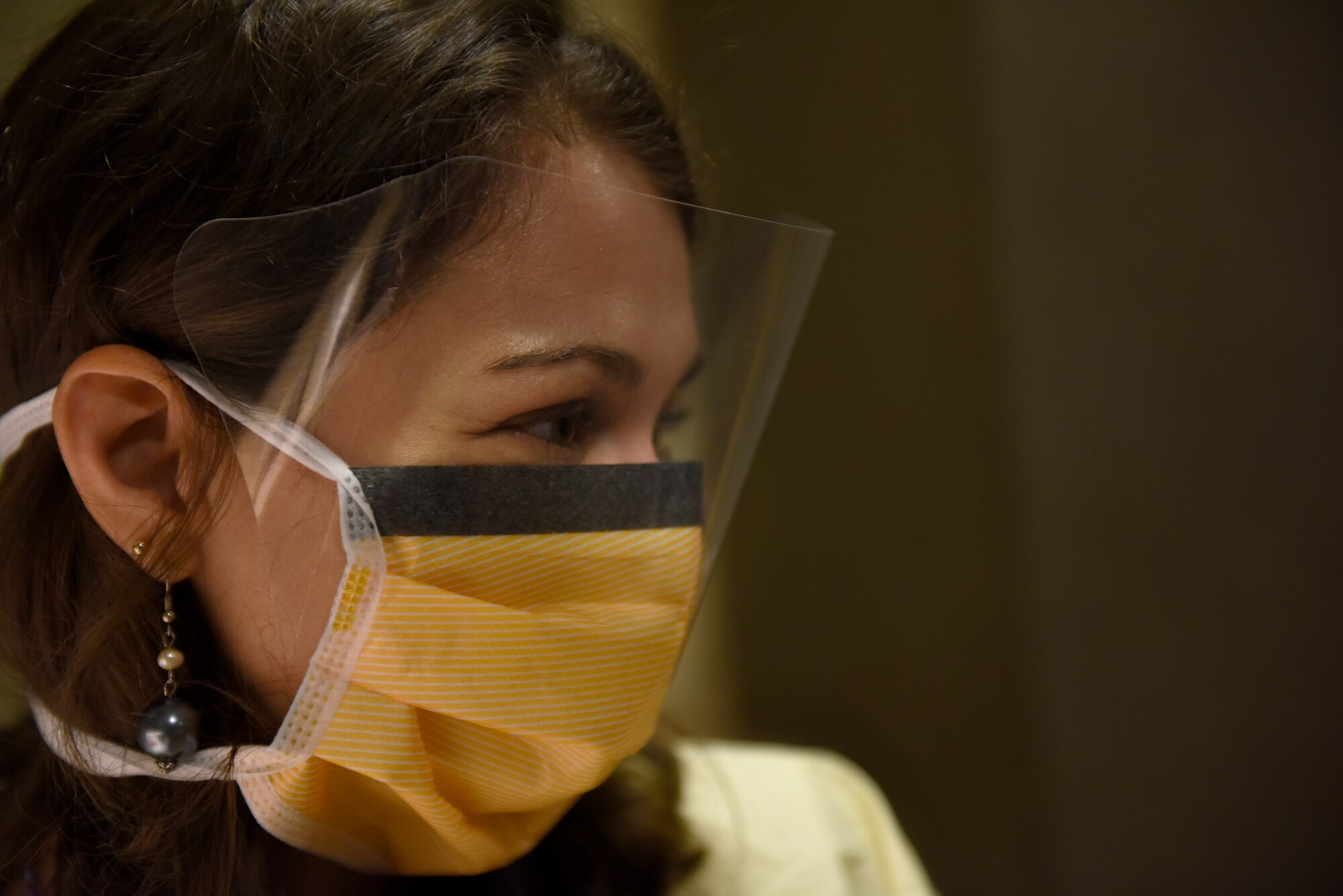 U.S. Air Force Captain Stephanie Smiddy, the infection and immunization officer-in-charge at the 180th Fighter Wing, Ohio Air National Guard, assists with a cancer treatment, April 8, 2019, at the University of Toledo Medical Center where she works as the head research nurse for the precision oncology department at the Eleanor N. Dana Center. Smiddy provides care for patients undergoing experimental immunotherapy treatments in the research program. (U.S. Air National Guard photo by Staff Sgt. Shane Hughes)