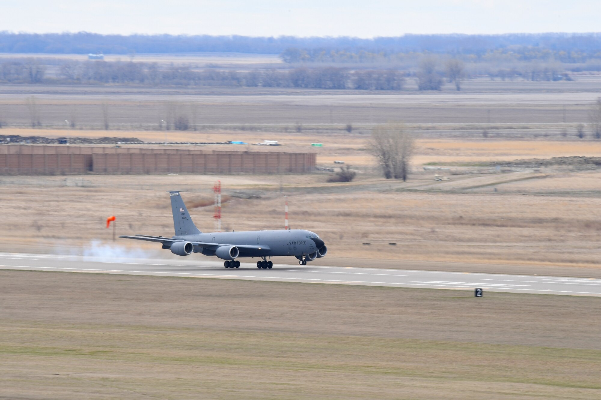 A KC-135 Stratotanker, assigned to the 22nd Air Refueling Wing, lands May 6, 2019, on Grand Forks Air Force Base, North Dakota. This KC-135 was one of several to be housed on Grand Forks AFB temporarily as inclement weather passed near McConnell AFB, Kansas. (U.S. Air Force photo by Senior Airman Elora J. Martinez)
