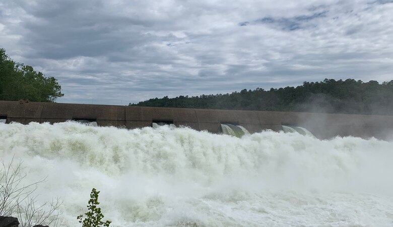 CAPTION - A reclamation dam below Broken Bow Dam in southeastern Oklahoma catches and releases about 3,300 cubic feet per second, May 7. The reclamation dam slows down releases from Broken Bow Dam just upstream and helps prevent downstream erosion by flattening and slowing the release. (Photo by Stacey Reese)