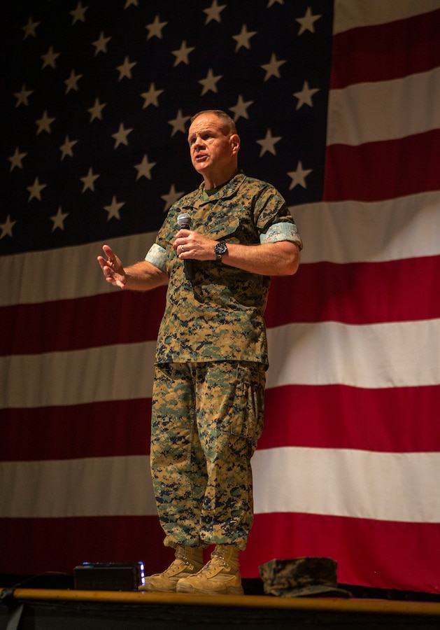 Gen. Robert B. Neller, Commandant of the Marine Corps, speaks to Marines during a town hall meeting at the Bob Hope Theater on Marine Corps Air Station Miramar, Calif., May 8. The town hall meeting gave personnel an opportunity to ask and have their questions answered by the Commandant of the Marine Corps in an open forum. (U.S. Marine Corps photo by Sgt. Becky Cleveland)