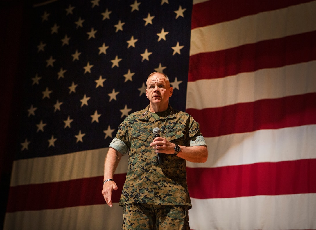 Gen. Robert B. Neller, Commandant of the Marine Corps, speaks to Marines during a town hall meeting at the Bob Hope Theater on Marine Corps Air Station Miramar, Calif., May 8. The town hall meeting gave personnel an opportunity to ask and have their questions answered by the Commandant of the Marine Corps in an open forum. (U.S. Marine Corps photo by Sgt. Becky Cleveland)