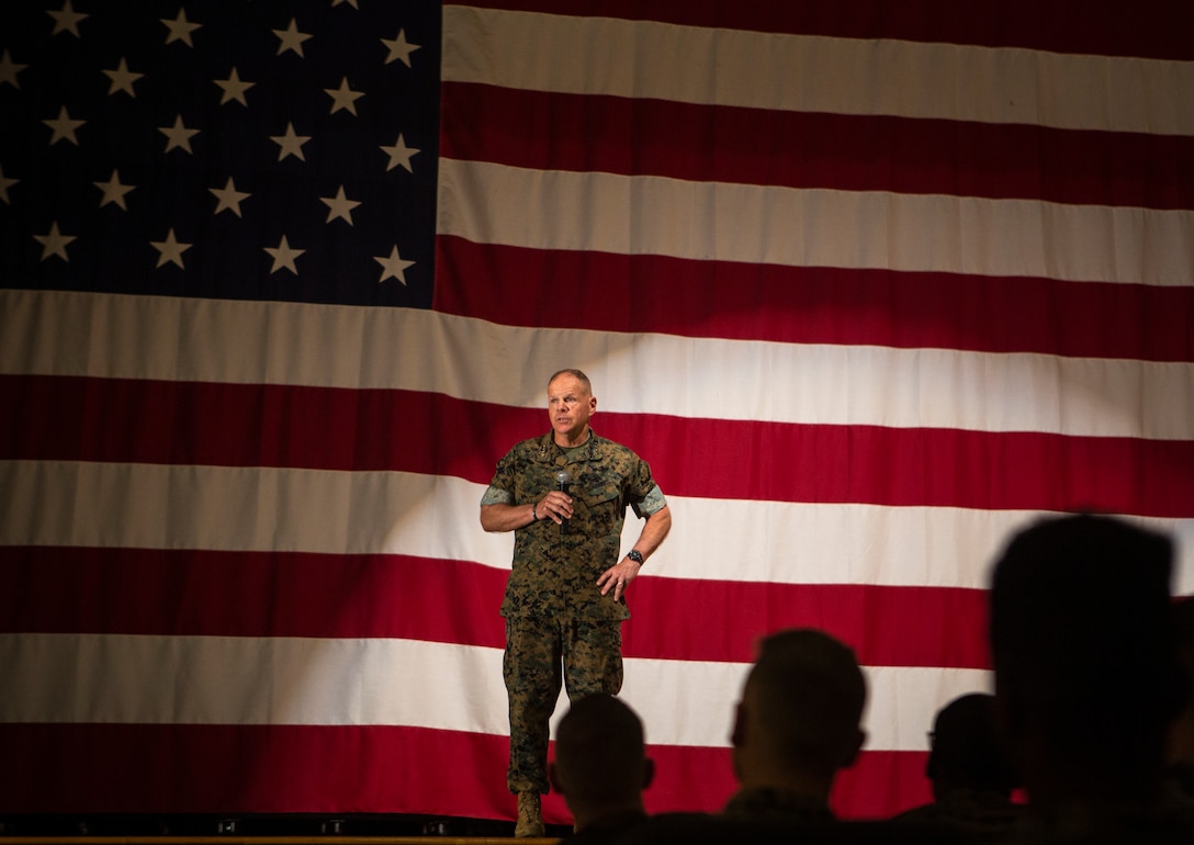 Gen. Robert B. Neller, Commandant of the Marine Corps, speaks to Marines during a town hall meeting at the Bob Hope Theater on Marine Corps Air Station Miramar, Calif., May 8. The town hall meeting gave personnel an opportunity to ask and have their questions answered by the Commandant of the Marine Corps in an open forum. (U.S. Marine Corps photo by Sgt. Becky Cleveland)