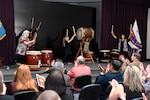 Taiko drummers educate their audience on their 2,000-year-old musical art form, which includes choreographed movements that mirror Japanese martial arts.