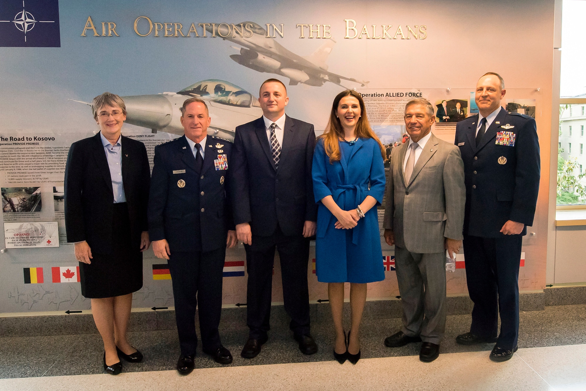 Secretary of the Air Force Heather Wilson, Air Force Chief of Staff Gen. David L. Goldfein, Muharren Alija, Ambassador of the Republic of Kosovo Vlora Çitaku, retired Lt. Gen. Dan Leaf, former 31st Fighter Wing and 31st Expeditionary Wing commander, Aviano Air Base, Italy and Brig. Gen. Chris Short, Aircrew Crisis Task Force director, pose for a photo in front of a new display commemorating the 20th anniversary of Operation Allied Force during a ceremony at the Pentagon, Arlington, Va., May 8, 2019. Operation Allied Force was initiated in 1999 by NATO in response to Serbian President Slobodan Milosevic’s campaign of ethnic cleansing of Kosovar Albanians. (U.S. Air Force photo by Adrian Cadiz)