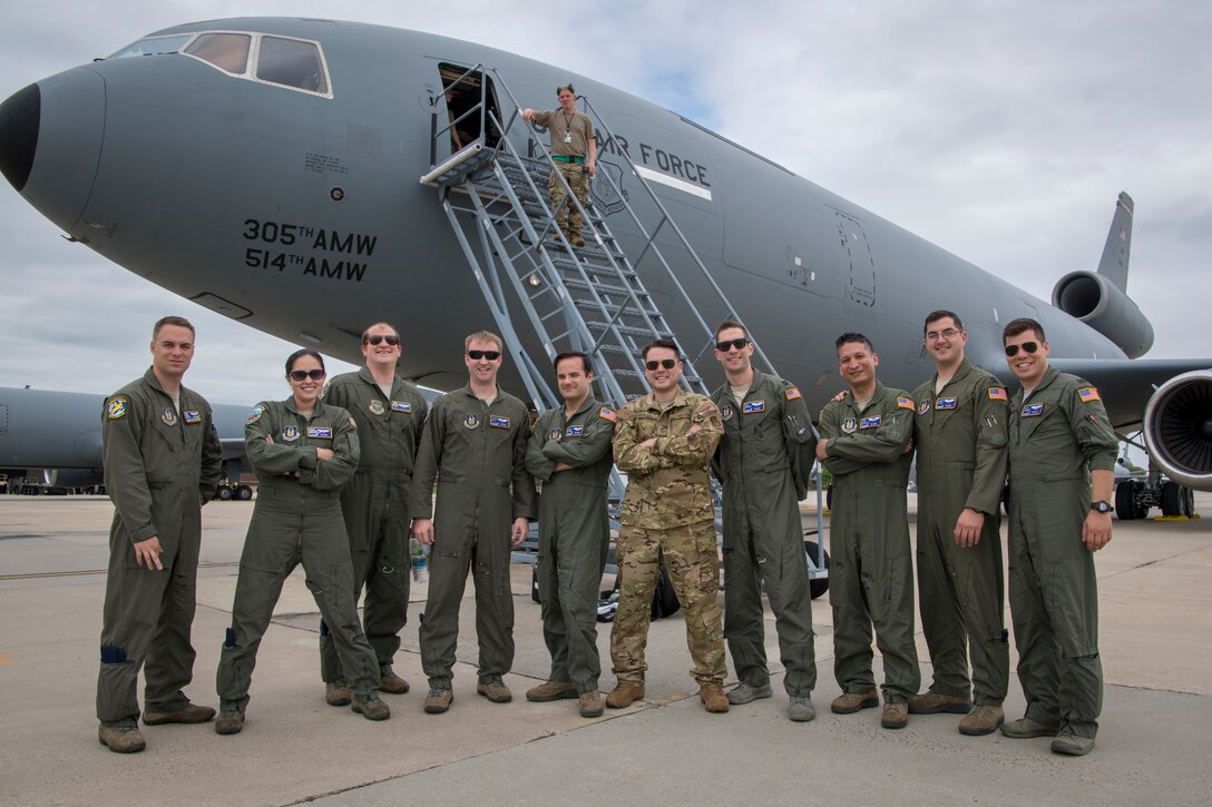Members from the 76th and 78th Air Refueling Squadrons with the 514th Air Mobility Wing and the 2nd ARS with the 305th AMW, both at Joint Base McGuire-Dix-Lakehurst, N.J., pose for a photo upon completion of a coronet mission to provide centerline drogue air refueling for the Blue Angels on their way to Joint Base Andrews, Md. for an air show, May 8, 2019.  (U.S. Air Force photo by Senior Airman Ruben Rios)