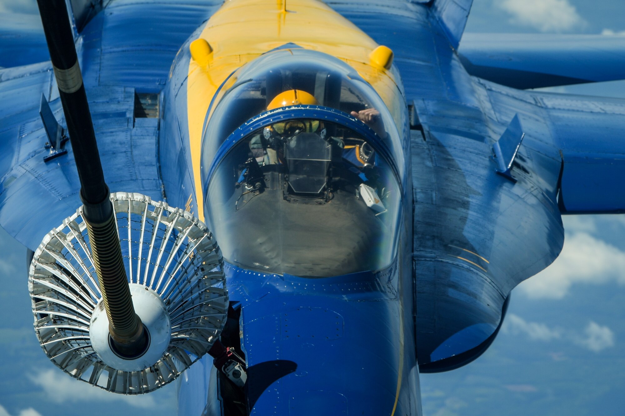 U.S. Marine Corp. Maj. Jeff Mullins, slot pilot of the U.S. Navy Flight Demonstration Squadron, the Blue Angels, receives centerline drogue air refueling from the 78th Air Refueling Squadron, 514th Air Mobility Wing, Joint Base McGuire-Dix-Lakehurst, N.J., May 8, 2019. The 78th ARS provided air refueling for the Blue Angels on their way to Joint Base Andrews, Md. for an air show. (U.S. Air Force photo by Senior Airman Ruben Rios)