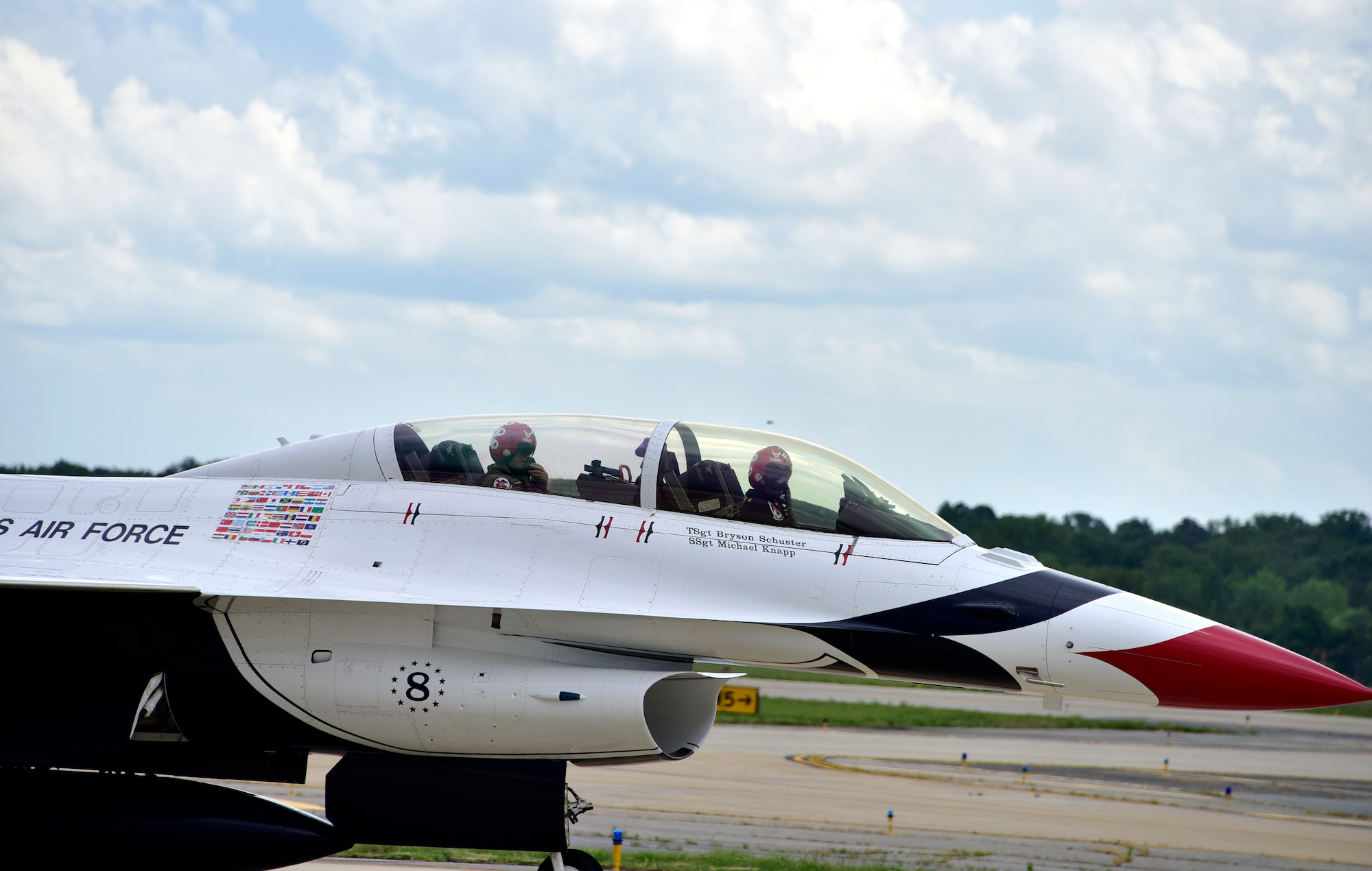 Maj. Jason Markzon, Advance Pilot/Narrator for the U.S. Air Force Demonstration Squadron “Thunderbirds”, front, and Todd Heap, former tight end for the Baltimore Ravens, land after their flight on Joint Base Andrews, Md. May 9, 2019. After arriving at JBA, the Thunderbirds met with Heap and practiced their performance in preparation for the 2019 JBA Legends in Flight Air & Space Expo. (U.S. Air Force photo by Airman 1st Class Noah Sudolcan)