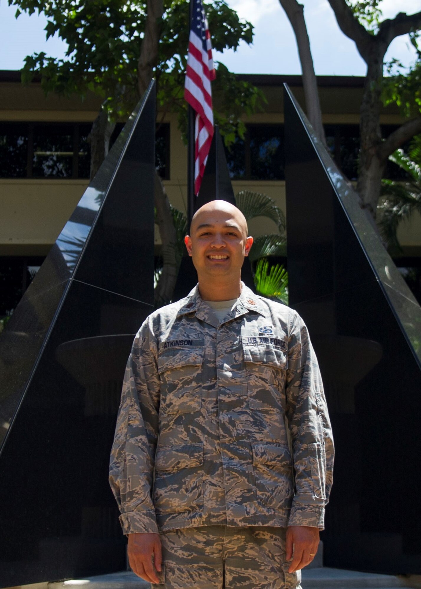 Maj. Andrew Atkinson, Pacific Air Forces Analyses, Assessments, and Lessons Learned branch chief, poses for a photo in the Courtyard of Heroes at Headquarters PACAF, Joint Base Pearl Harbor-Hickam, Hawaii, May 7, 2019. Atkinson was announced as the recipient of the 2019 Military Operations Research Society’s Wayne P. Hughes Junior Analyst of the Year award at the Department of Defense level. (U.S. Air force photo by Staff Sgt. Mikaley Kline)