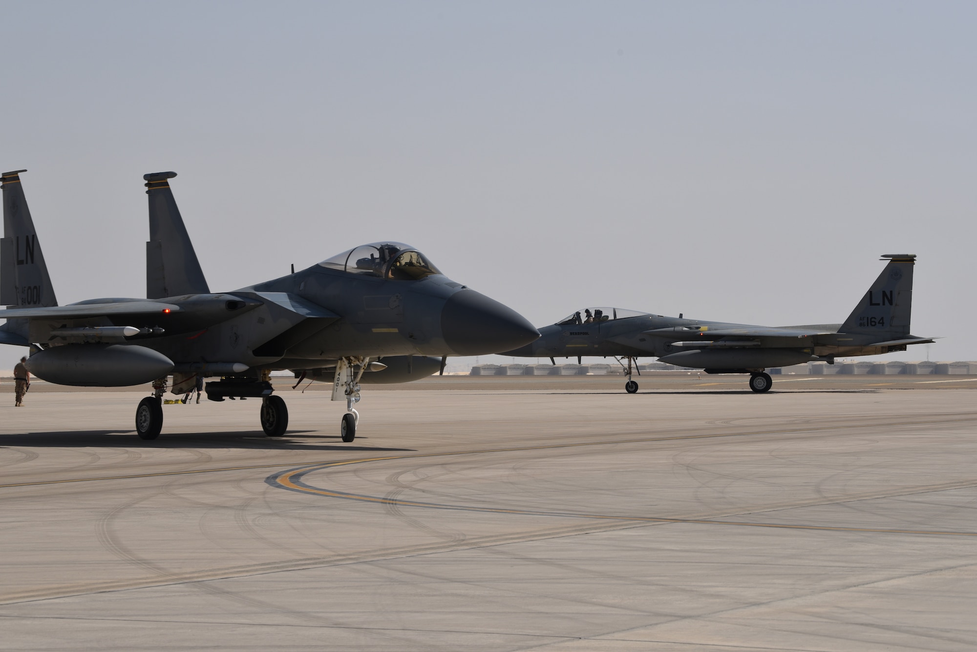 A photo of two F-15s.