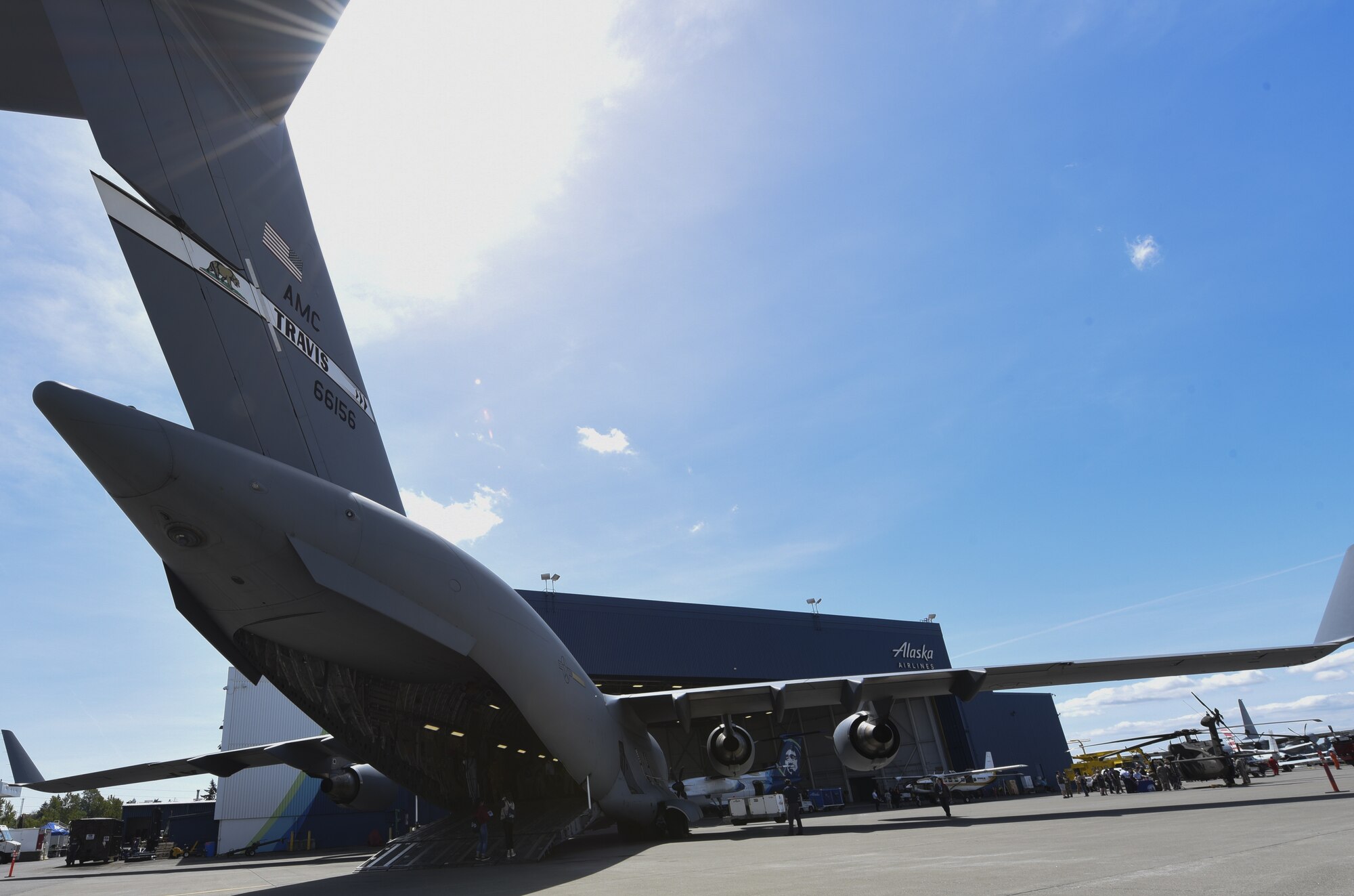 A C-17 Globemaster III static sits on the flight line May 4, 2019, as part of the Alaska Airlines Aviation Day in Seattle, Washington. More than 800 students were able to interact with 21st Airlift Squadron crew members from Travis Air Force Base, California, while touring the C-17 with the overall mission of inspiring youth to pursue potential careers in aviation and aerospace. (U.S. Air Force photo by Staff Sgt. Amber Carter)