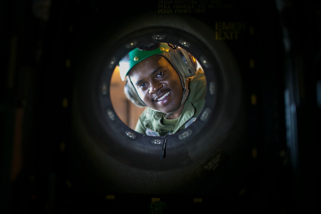 Lance Cpl. Celestin Wikenson, an airframer with Marine Medium Tiltrotor Squadron 262 (Reinforced), maintains the skin of a MV-22B Osprey helicopter Marine Corps Air Station Futenma, Okinawa, Japan, March 28, 2019.