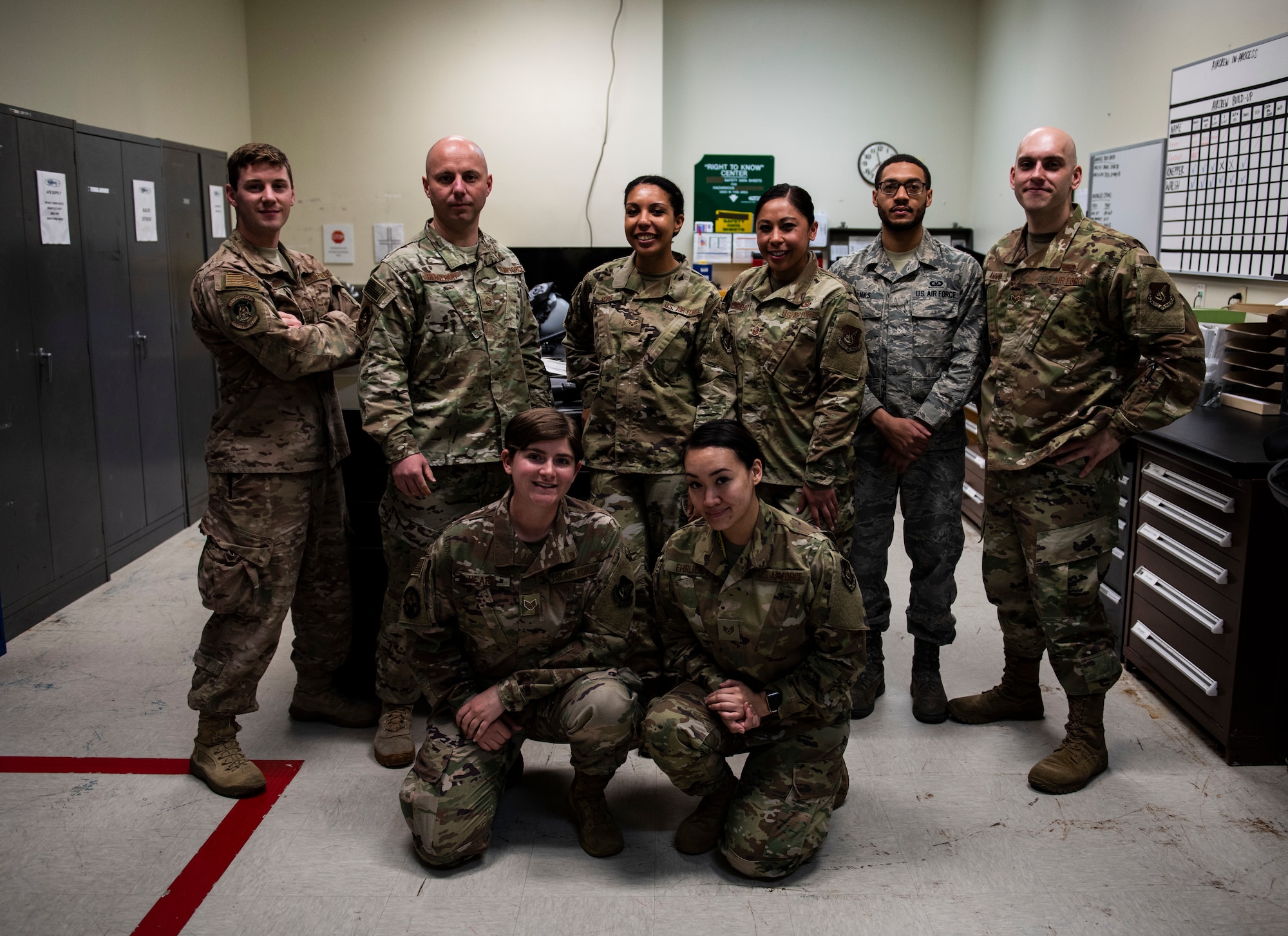 Members of the 8th Operations Support Squadron aircrew flight equipment flight from the 35th and 80th Fighter Squadrons pose for a photo at Kunsan Air Base, Republic of Korea, April 29, 2019. The 8th OSS AFE flight is split up in two different fighter squadrons, but will work together when manning is low due to TDYs or deployments to keep the mission going. (U.S. Air Force photo by Senior Airman Stefan Alvarez)