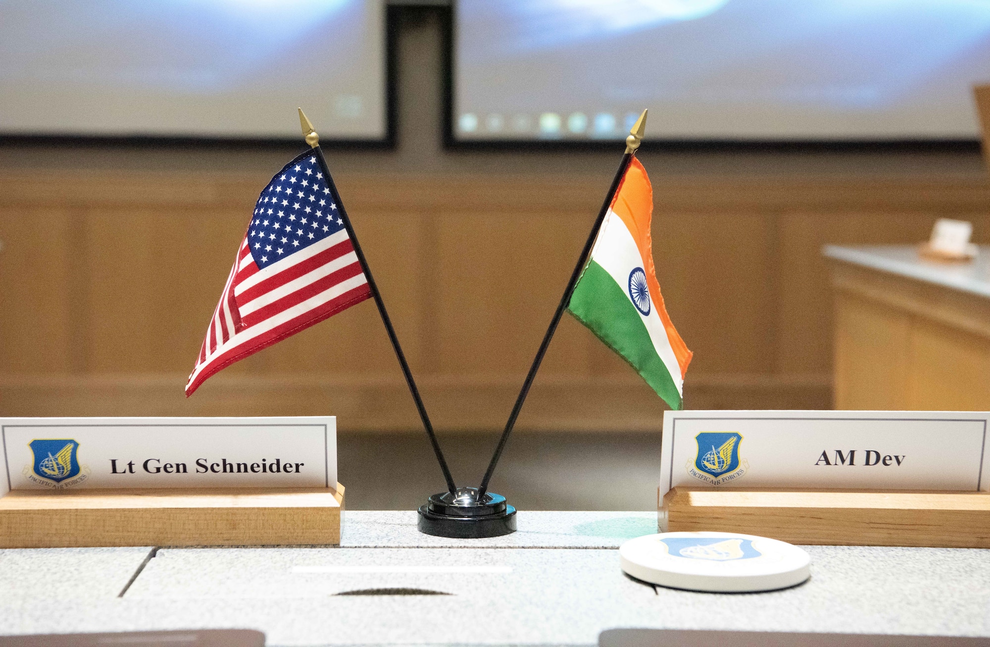 Flags from the Republic of India and United States sit side-by-side at the head table of the annual India Executive Steering Group at Joint Base Pearl Harbor-Hickam, Hawaii, May 1, 2019. This year marks the 22nd iteration of the steering group between the two nations and is the primary venue for determining future engagements between the two air forces. (U.S. Air Force photo by Staff Sgt. Daniel Robles)