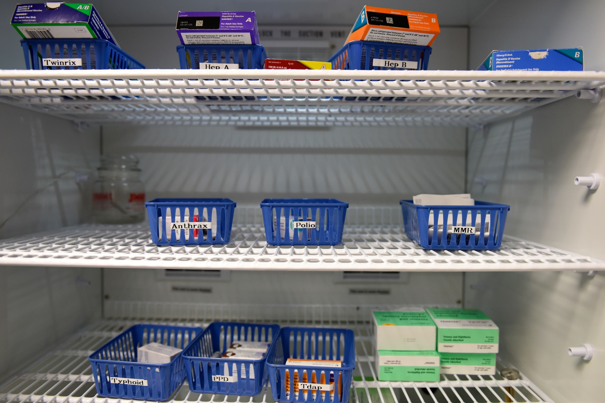 Vaccines sit in a refrigerator, March 2, 2019, at the 180th Fighter Wing, Ohio Air National Guard in Swanton, Ohio. Capt. Stephanie Smiddy, infection and immunization officer-in-charge at the 180FW, manages the vaccination program, ensuring Airmen are always ready to deploy to any location in the world. (U.S. Air National Guard photo by Staff Sgt. Shane Hughes)