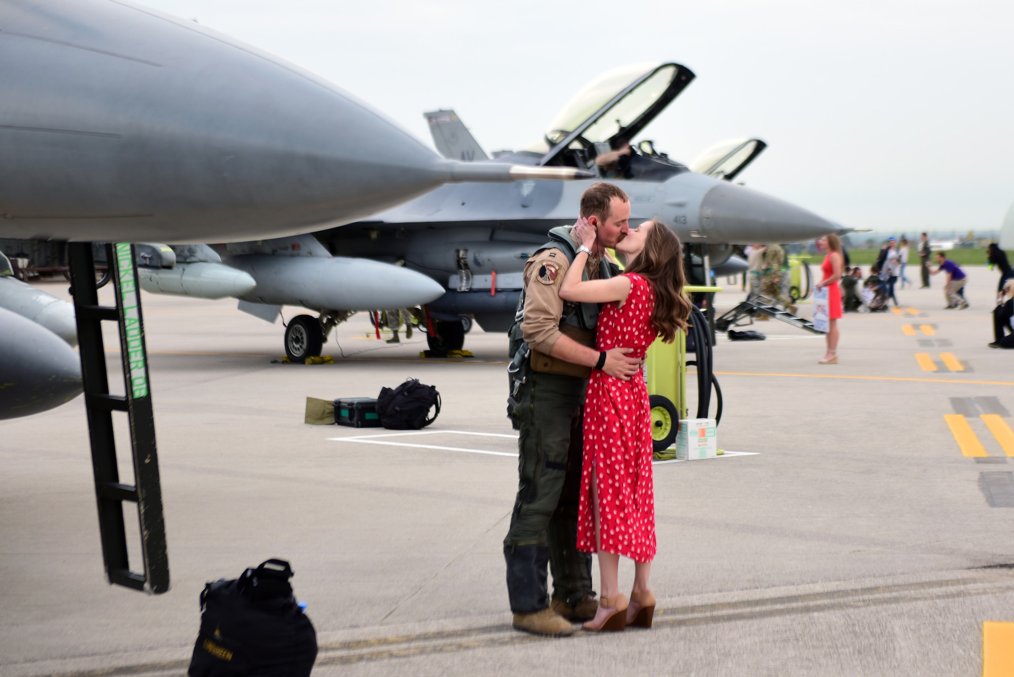 A 510th Fighter Squadron Airman returns home from a deployment and reunites with his wife at Aviano Air Base, Italy, April 30, 2019. The 510th FS maintains a rapidly deployable stance. (U.S. Air Force photo by Senior Airman Kevin Sommer Giron)
