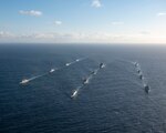 Ships steam in formation