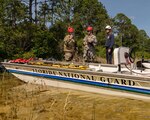 A task force team comprised of Florida National Guardsmen and civilian first responders rehearse a maritime rescue at Kingsley Lake on Camp Blanding Joint Training Center as part of the annual Search and Rescue Exercise.