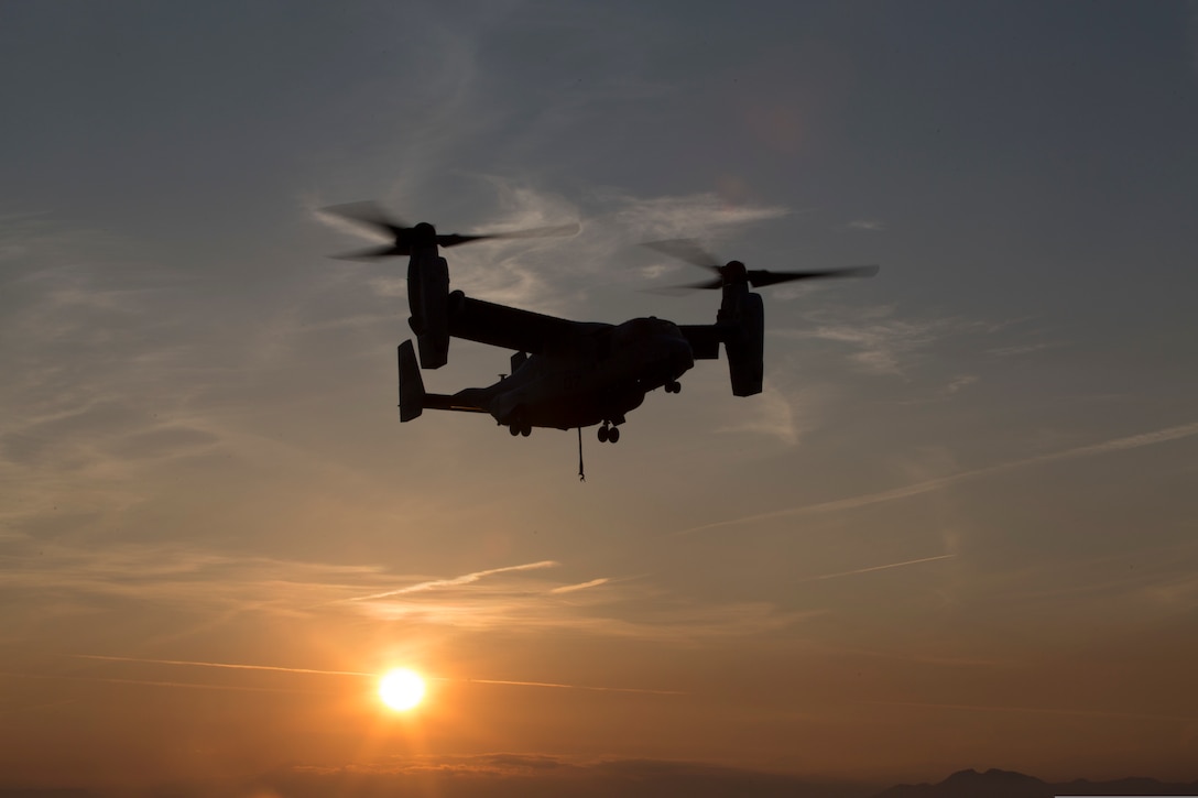 A U.S. Marine Corps MV-22B Osprey with Special Purpose Marine Air-Ground Task Force-Crisis Response-Africa 19.2, Marine Forces Europe and Africa, lands during external-lift training at Naval Air Station Sigonella, Italy, April 18, 2019. SPMAGTF-CR-AF is deployed to conduct crisis-response and theater-security operations in Africa and promote regional stability by conducting military-to-military training exercises throughout Europe and Africa.