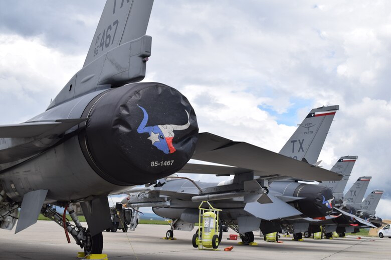 U.S. Air Force Airmen assigned to the 301st Fighter Wing, Naval Air Station Joint Reserve Base Fort Worth, Texas, maintain F-16C Fighting Falcons at Campia Turzii, Romania, May 6, 2019, as part of Theater Security Package 19.1 in support of Operation Atlantic Resolve. Funded through the European Deterrence Initiative, TSP 19.1 provides a more robust U.S. military rotational presence in the European theater, capable of deterring, and if required, responding to regional threats. While in theater, these personnel and aircraft will participate in multiple readiness exercises alongside NATO allies and partners to strengthen interoperability and to demonstrate U.S. commitment to the stability and security of Europe (U.S. Air Force photo by 1st Lt. Andrew Layton).