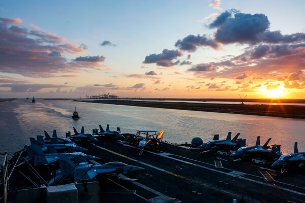 The Nimitz-class aircraft carrier USS Abraham Lincoln (CVN 72) transits the Suez Canal. The Abraham Lincoln Carrier Strike Group (ABECSG) is deployed to the U.S. Central Command area of responsibility in order to defend American forces and interests in the region. With Abraham Lincoln as the flagship, deployed strike group assets include staffs, ships and aircraft of Carrier Strike Group 12 (CSG 12), Destroyer Squadron 2 (DESRON 2), USS Leyte Gulf (CG 55) and Carrier Air Wing 7 (CVW 7); as well as the Spanish navy �lvaro de Baz�n-class frigate ESPS M�ndez N��ez (F 104). (U.S. Navy photo by Mass Communication Specialist Seaman Dan Snow/ Released)