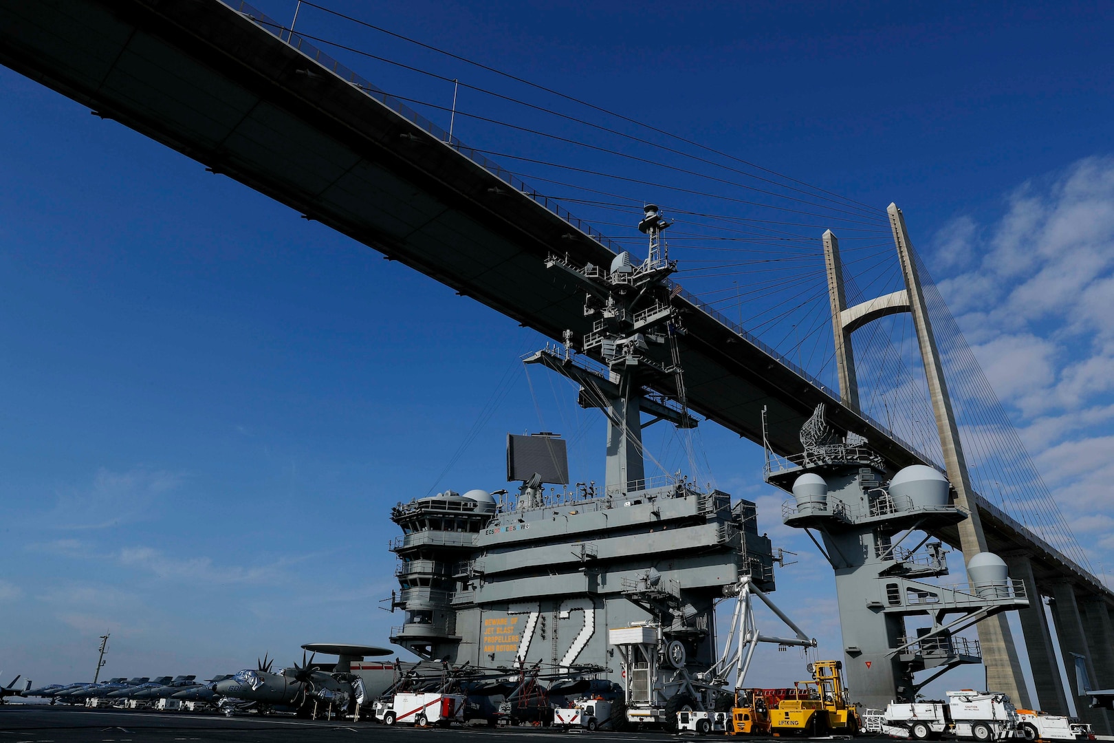 The Nimitz-class aircraft carrier USS Abraham Lincoln (CVN72) sails under the Peace Bridge while transiting the Suez Canal. The Abraham Lincoln Carrier Strike Group (ABECSG) is deployed to U.S. Central Command area of responsibility in order to defend American forces and interests in the region. With Abraham Lincoln as the flagship, deployed strike group assets include staffs, ships and aircraft of Carrier Strike Group 12 (CSG 12), Destroyer Squadron 2 (DESRON 2), USS Leyte Gulf (CG 55) and Carrier Air Wing 7 (CVW 7); as well as the Spanish navy �lvaro de Baz�n-class frigate ESPS M�ndez N��ez (F 104). (U.S. Navy photo by Mass Communication Specialist 1st Class Brian M. Wilbur/Released)