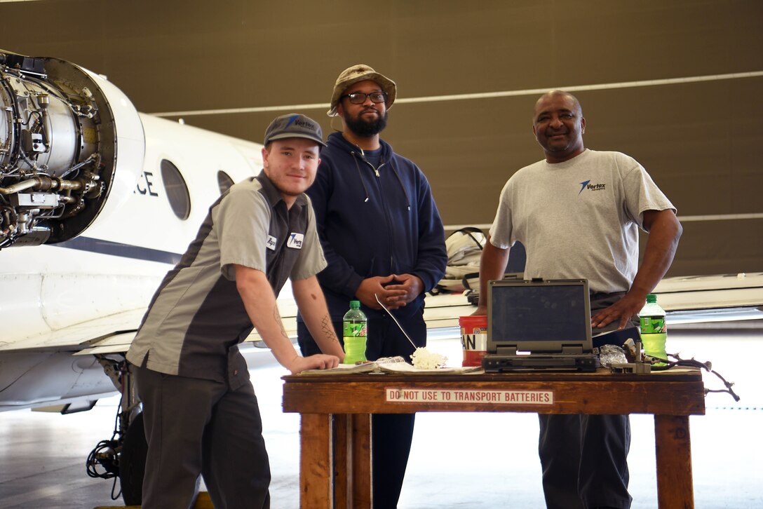 (Left to right) Alex Rayner, Terrence Herring and Billy Jackson, 48th Flying Training Squadron T-1A Jayhawk maintainers, take a break April 22, 2019, on Columbus Air Force Base, Miss. There are day, night and swing shifts maintaining 14th Flying Training Wing aircraft consistently to ensure pilots safety in the skies. (U.S. Air Force photo by Airman 1st Class Keith Holcomb)