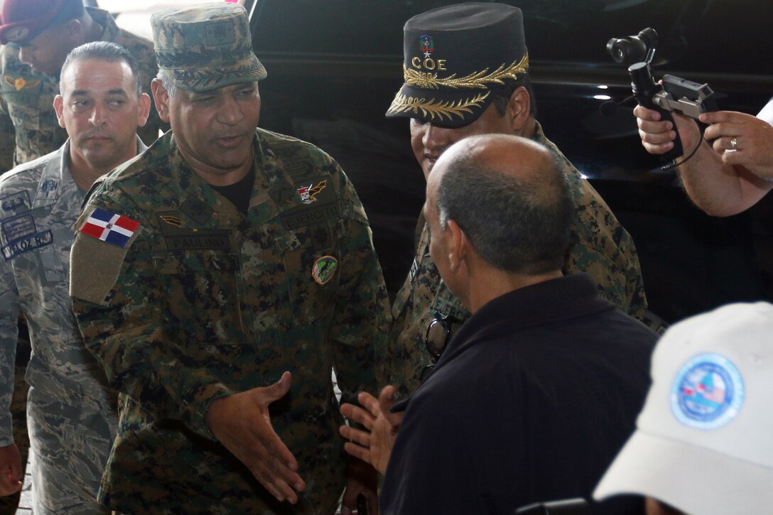 Lt. Gen. Ruben Danio Paulino Sem, the minister of defense for the Dominican Republic, meets with officials at the joint operations center of Fuerzas Aliadas Humanitarias 2019, May 7, 2019 in Santo Domingo.