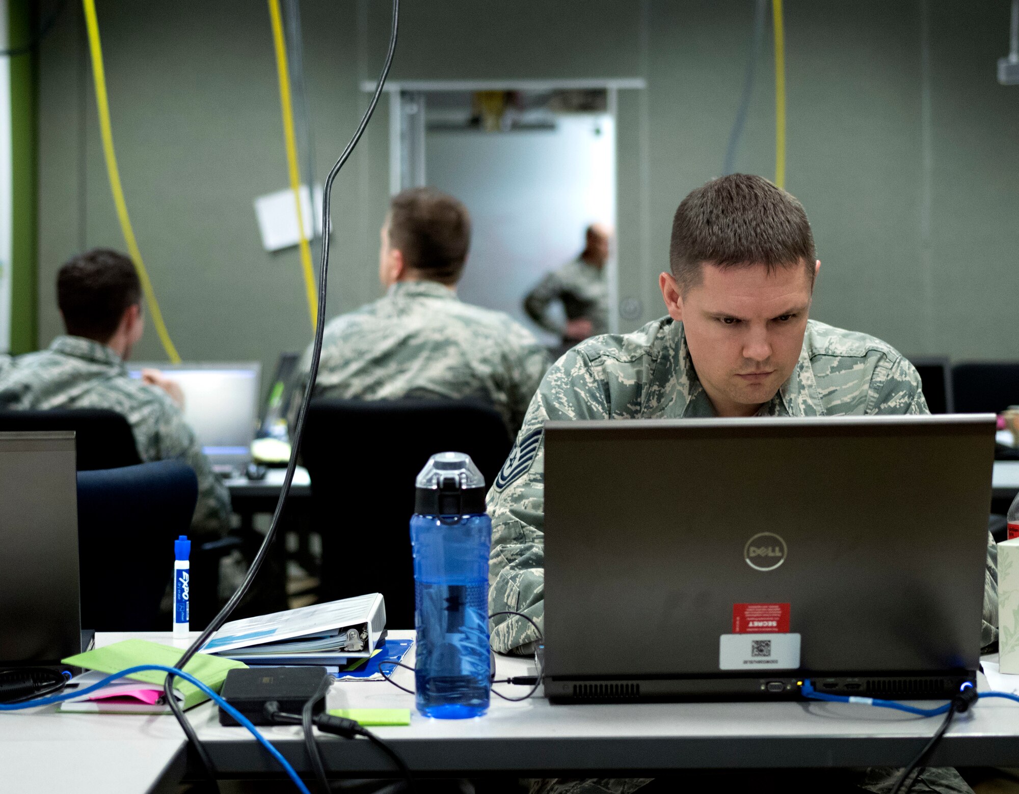 Air Force cyber operators participate in Exercise Black Demon 19-2 at Fort Sam Houston, Texas, May 9, 2019. The two-week-long exercise provided cyber mission forces and cybersecurity service partners an opportunity to demonstrate proficiency in defensive cyber tactics, techniques and procedures against an adversary. The exercise also marked the first time an installation-level mission defense team participated. (U.S. Army photo by Jesus Partida)