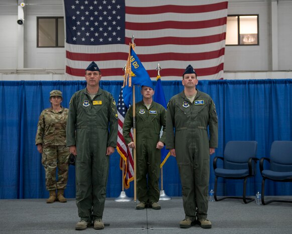 Col. Jeffery Patton, 49th Operations Group commander (left), and Lt. Col. Randall Noel, 491st Attack Squadron commander (right), stand at the position of attention, as part of a squadron activation and assumption of command ceremony, May 8, 2019, on Hancock Field Air National Guard Base, N.Y. Noel is the first to assume command over the 491st ATKS. (U.S. Air Force photo by Airman 1st Class Kindra Stewart)