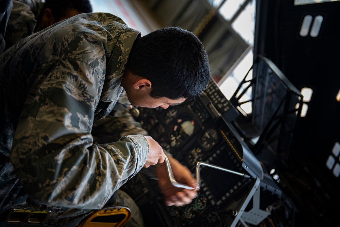 Airman Andres Cervera, 365th Training Squadron A-10 avionics apprentice course student, removes the display in the flightdeck of an A-10 Thunderbolt II at Sheppard Air Force Base, Texas, May 9, 2019. Cervera will remove and replace the display as part of his hands-on training. Avionics maintains most instruments in the flightdeck including indicators, displays, communications and more. (U.S. Air Force photo by Airman 1st Class Pedro Tenorio)