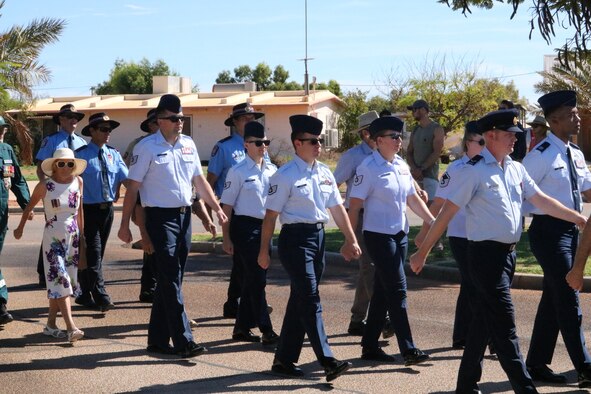 Airmen from 2nd Weather Squadron’s Detachment 1 march with members of the Royal Australian Air Force and Australian veterans during ANZAC Day ceremonies at Exmouth, Western Australia, April 25, 2019. The Detachment 1 Airmen recently celebrated the observatory’s 40th anniversary of operation, which is jointly operated by the U.S. Air Force and the Australian Bureau of Meteorology’s Space Weather Services. ANZAC Day marks the entry of Australia and New Zealand into World War I. (Courtesy photo)