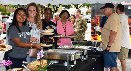 Former San Antonio Spurs legend David Robinson spoke to military spouses and children, signed autographs and shot some hoops during the Military Spouse Appreciation Day event at Joint Base San Antonio-Fort Sam Houston May 9. The event, sponsored by Johnsonville Sausage and the USO, included family-friendly games, basketball, music and food for military families at MacArthur Field, across from the Lincoln Family Housing Community Center at JBSA-Fort Sam Houston.