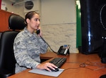 Senior Airman Danielle Otto, senior emergency actions controller, receives a call while on duty, April 25,2019, Joint Base San Antonio-Fort Sam Houston, Texas. Otto is the 2018 Command Post Airman of the Year for Air Education and Training Command.