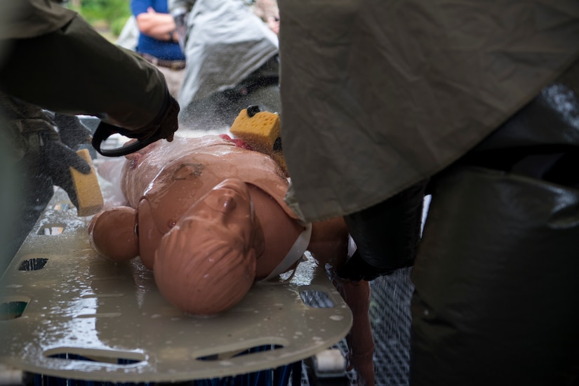 Airmen from the 628th Medical Group decontaminate a simulated casualty during an exercise May 9, 2019, at Joint Base Charleston, S.C.