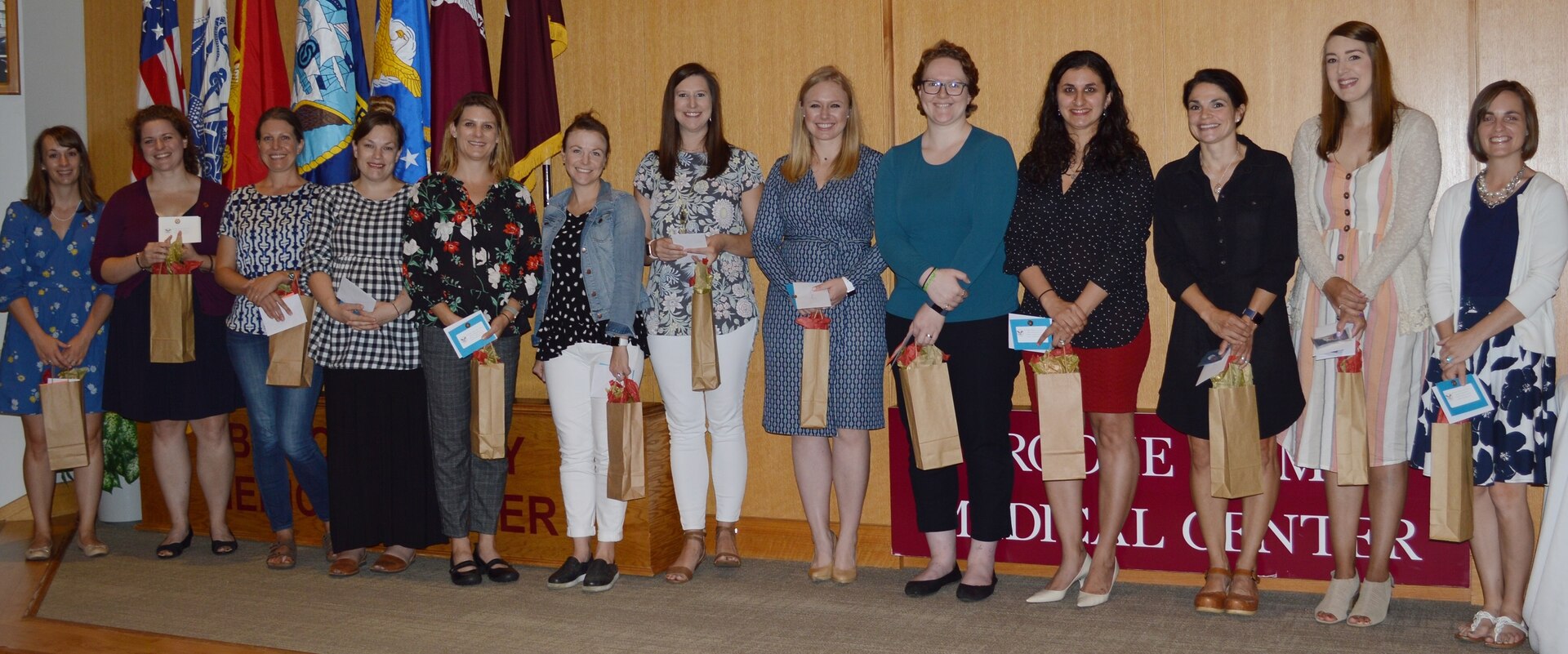 Brooke Army Medical Center Auxiliary board members pose for a photo after the annual Welfare Recognition Ceremony held May 6 in the auditorium. This year, the Auxiliary provided 25 grants totaling $28,000 to help support patient care at BAMC.