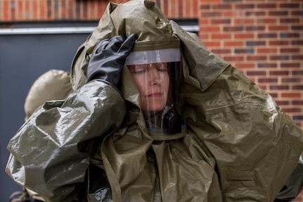 Capt. Malory Morris, a dentist assigned to the 628th Aerospace Medical Squadron, puts on her personal protective equipment during an exercise May 9, 2019, at Joint Base Charleston, S.C.