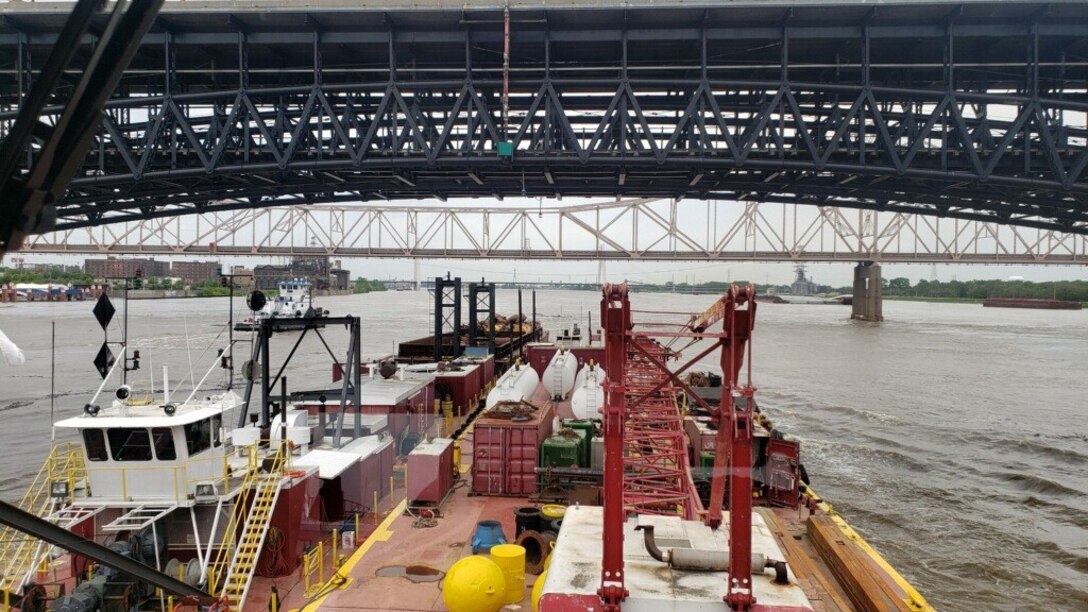 MV Tate is clearing the Eads Bridge in downtown St. Louis.