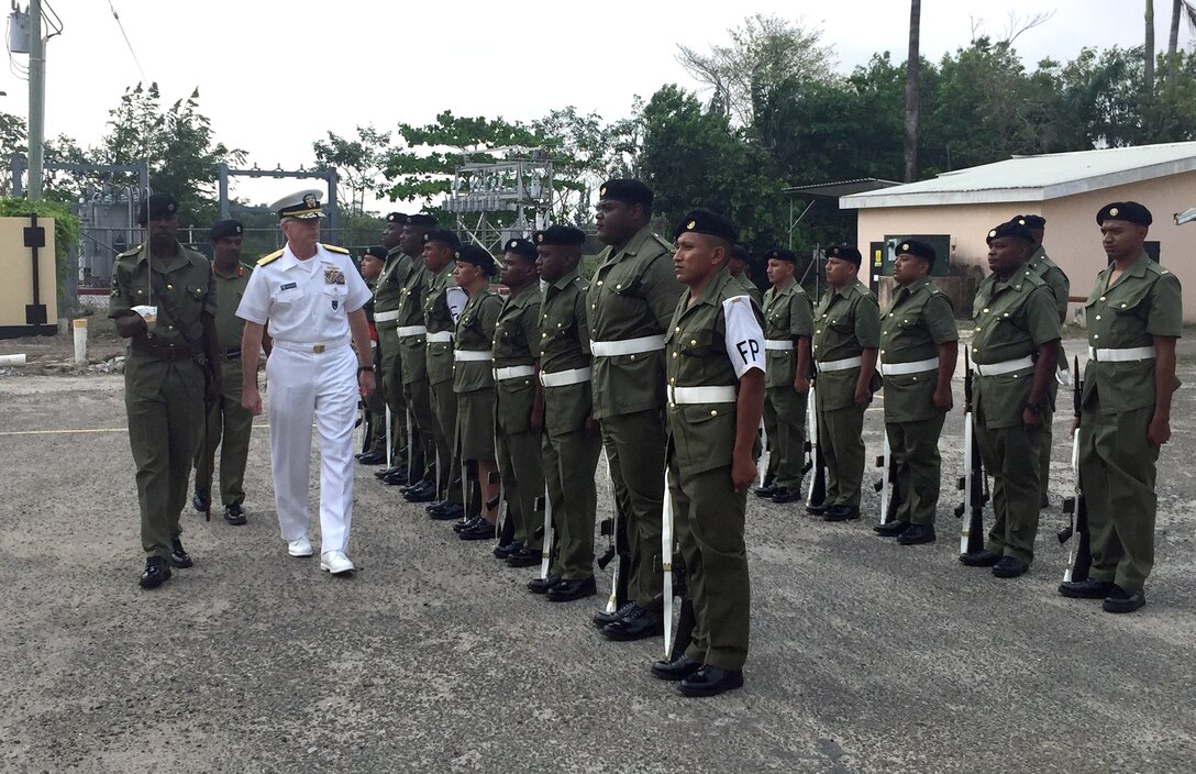 The commander of U.S. Southern Command, Navy Adm. Craig Faller, visits the headquarters of the Belize Defence Force.