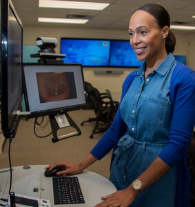 Zekelia Rembert, virtual health nurse care coordinator, reviews patient photos using the virtual health cart at the Virtual Medical Center at Brooke Army Medical Center, Joint Base San Antonio-Fort Sam Houston May 10. The team at the Virtual Health Center at Brooke Army Medical Center and Regional Health Command – Central has been selected as the 2018 U.S. Army Medical Department Mercury Award winner for Health Information Technology Team of the Year.