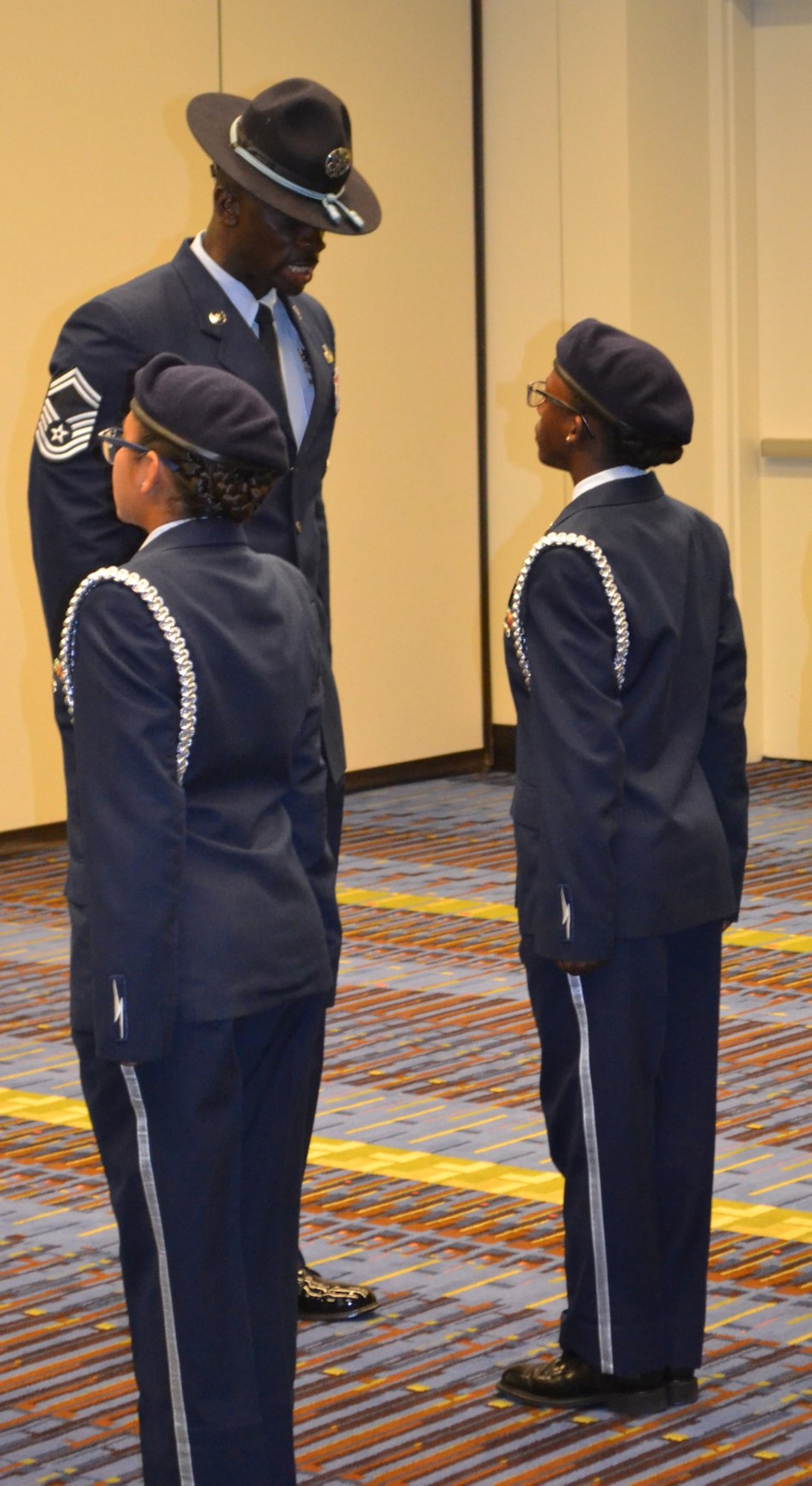 U.S. Air Force Senior Master Sgt. Gabriel Lewis, Officer Training School military training instructor from Maxwell Air Force Base, Ala., inspects cadets at the National High School Drill Team Competition, May 3-5 2019, at Daytona Beach, Fla.  Three MTIs from OTS participated as judges for the event to help determine which units would take home the top prize. The competition was a three-day event where 68 Junior Reserve Officer Training Corps drill teams from all services competed against each other for titles in more than 50 events.