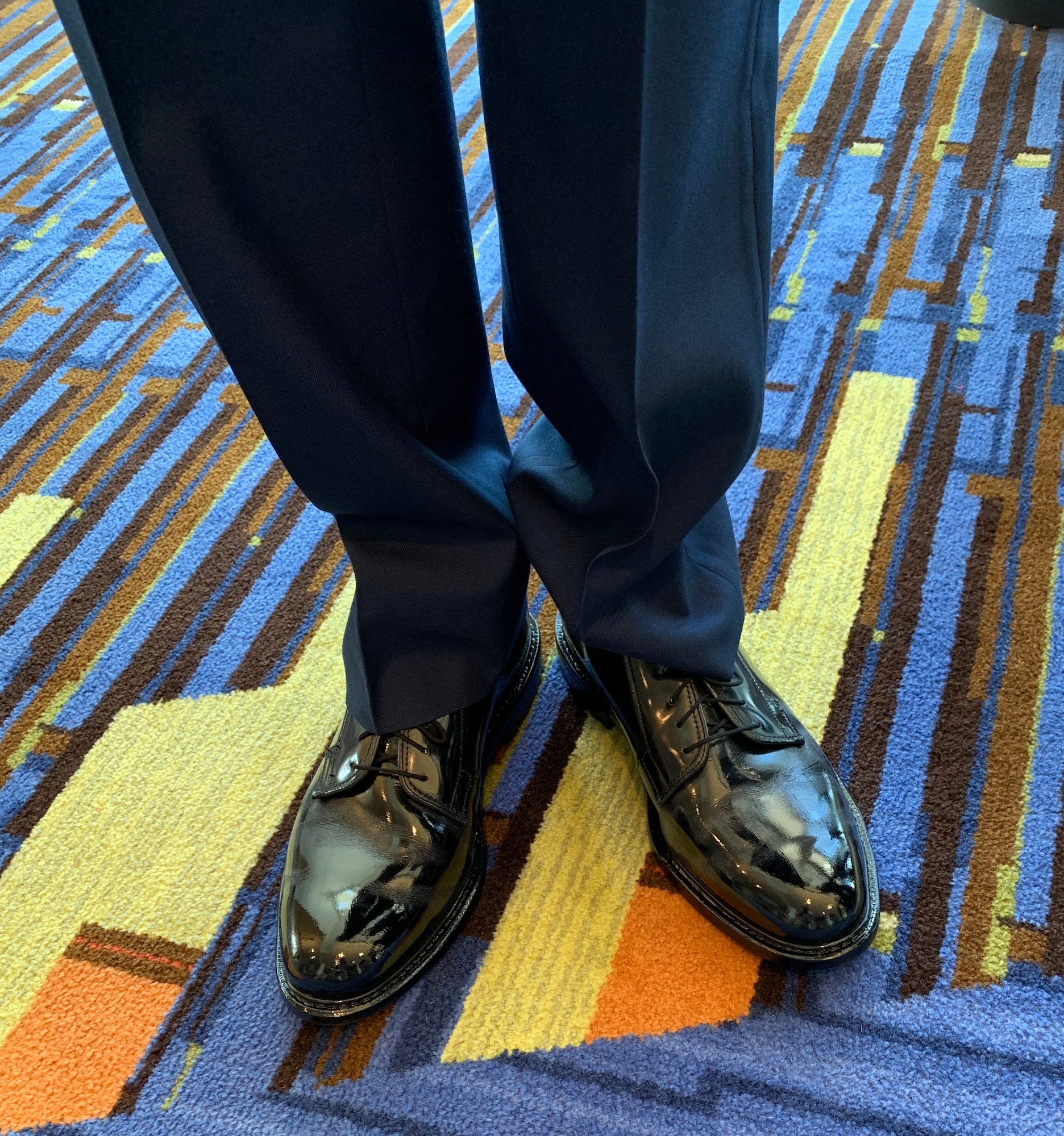 Air Force Junior ROTC Cadet Colton Moore, East Paulding High School, Ga., showcases his spit-shined dress shoes during the National High School Drill Team Competition May 3-5, 2019, at Daytona Beach, Fla. Cadet Moore took top honors and won the Demilitarized Armed Commander Trophy. Not only do cadets practice for hours after school on their drill performance, they also put in hours of work on every aspect of their uniform and personal grooming standards.