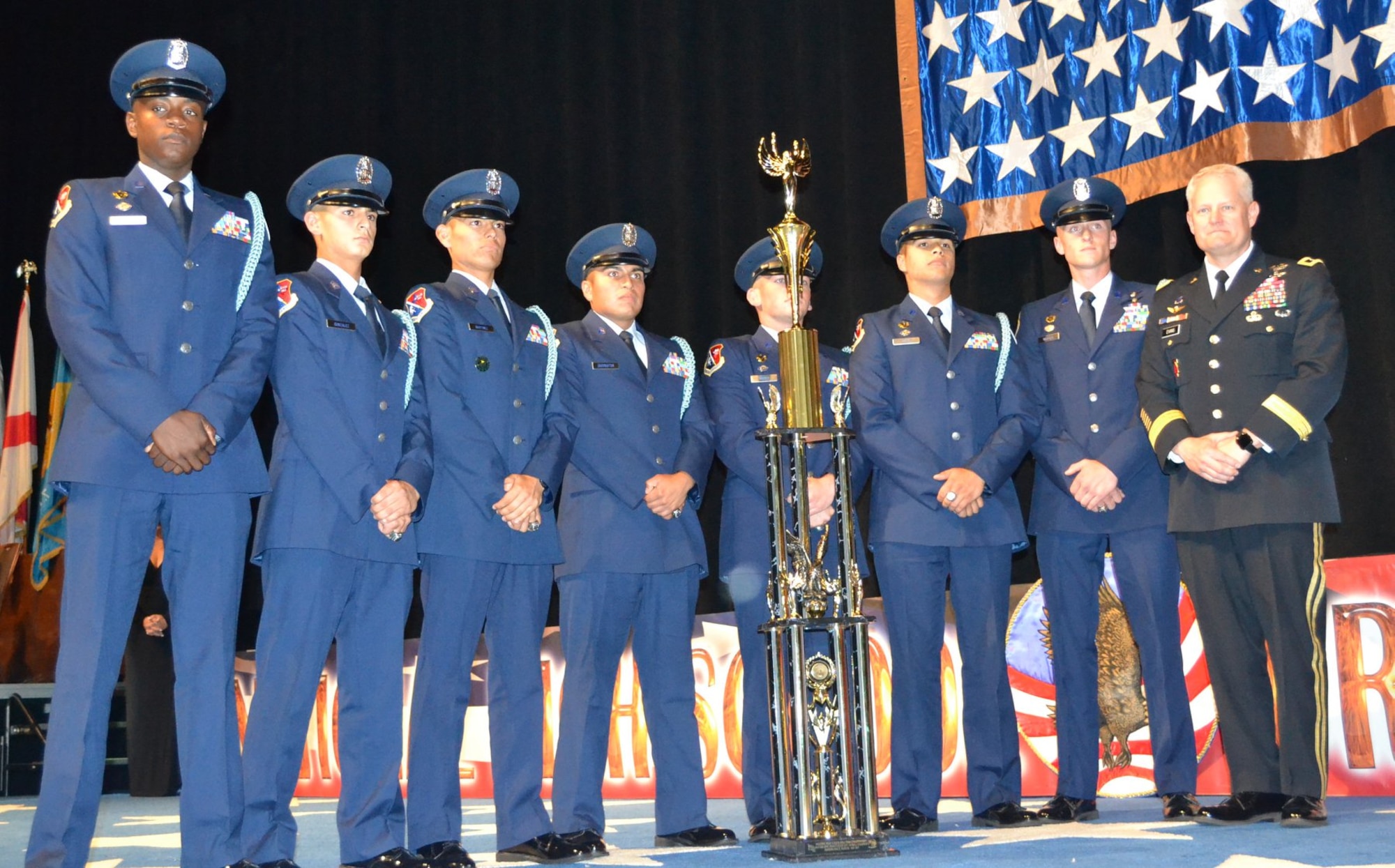 John Jay Silver Eagles from Jay High School in San Antonio stand together after winning their fourth national title in five years at the National High School Drill Team Competition, May 3-5, 2019, at Daytona Beach, Fla. The competition was a three-day event where 68 Junior Reserve Officer Training Corps drill teams from all services compete against one another for titles in more than 50 events.  U.S. Army Maj. Gen. John R. Evans Jr., Army Cadet Command commander, presented the Silver Eagles’ trophy during the award ceremony.  In total, John Jay High School took home 22 trophies from the competition.