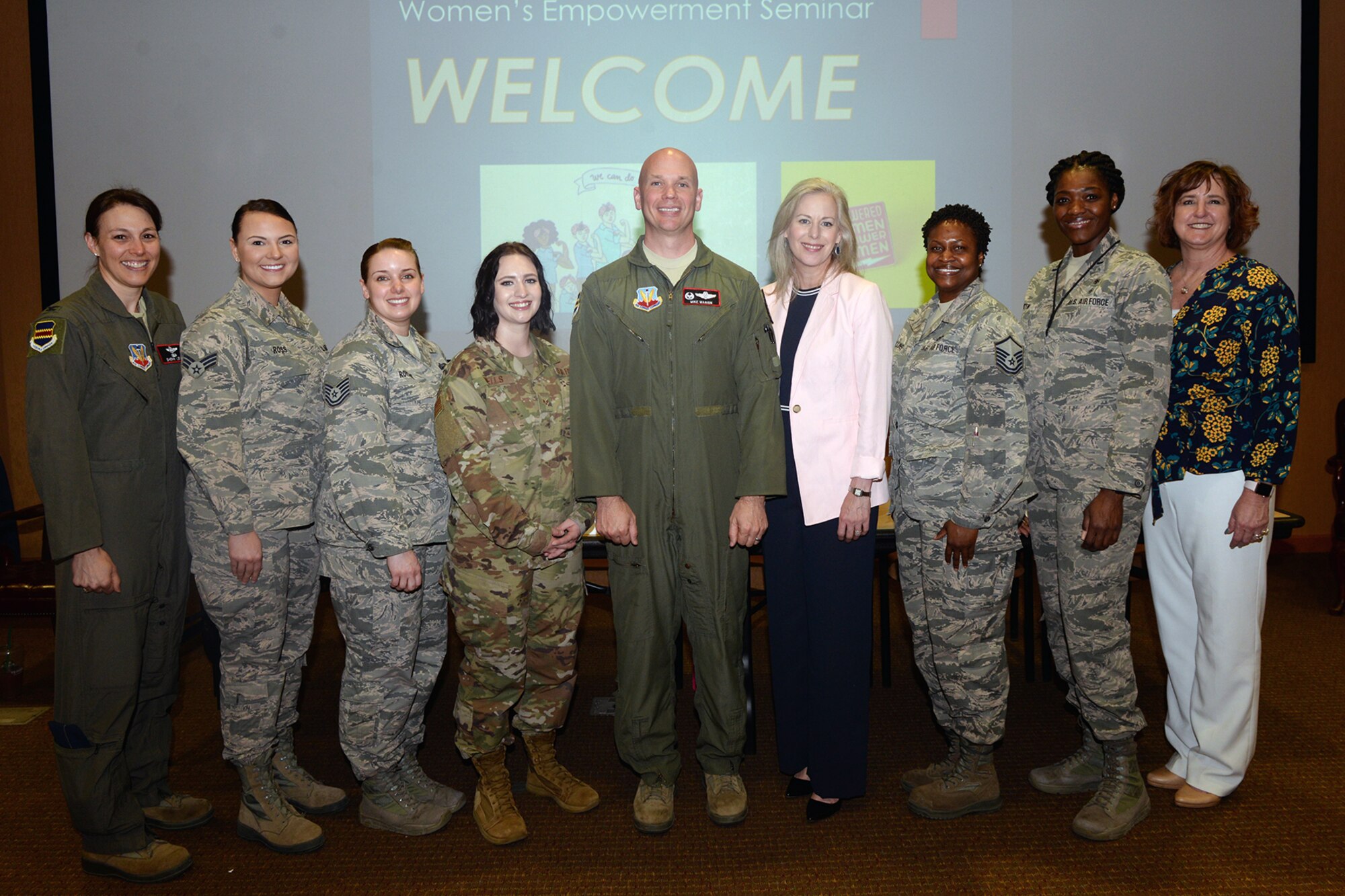 U.S. Air Force Col. Michael Manion, 55th Wing commander, poses for a photo with the panelist from the Women Empowering Women seminar April 17, 2019, at Offutt Air Force Base, Nebraska. The seminar featured a panel of seven women who spoke on varied topics such as self-awareness, burnout and balance, reinventing yourself after trauma, overcoming adversity, finding your why and self-care. (U.S. Air Force photo by Kendra Williams)