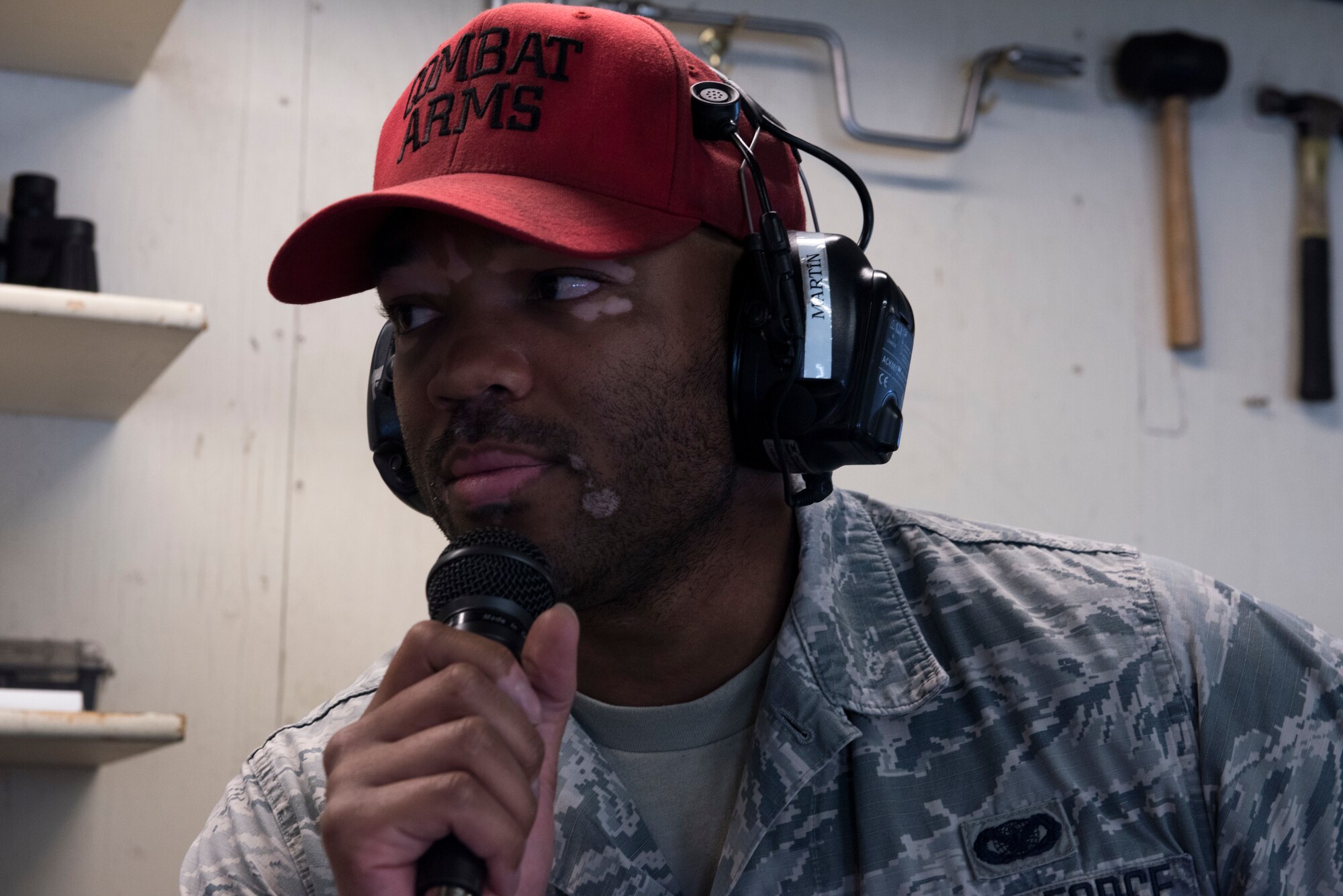 Staff Sgt. Corey Martin, 366th Security Forces Squadron combat arms instructor gives instructions on the firing line April 25, 2019, at Mountain Home Air Force Base, Idaho. Combat arms instructors guide Airmen through the process of safely loading and firing weapons. (U.S. Air Force Photo by Airman 1st Class Hailey Bivens)