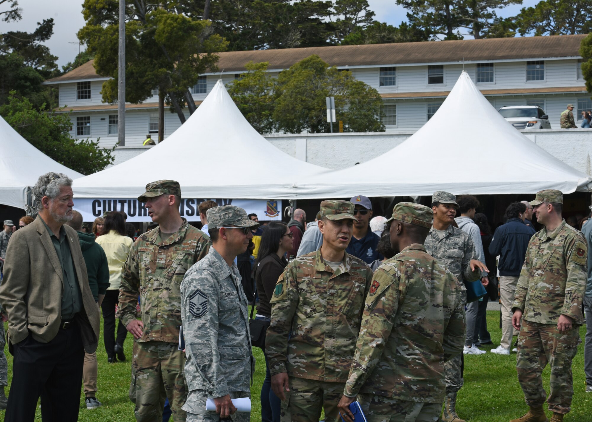 U.S. Air Force Senior Master Sgt. Richard Sanchez, 314th Training Squadron operations superintendent, Col. Ricky Mills, 17th Training Wing commander, and Chief Master Sgt. Lavor Kirkpatrick, 17th Training Wing command chief, attend Language Day at Presidio of Monterey, Calif., May 10, 2019. Language Day is a measurable display of the knowledge that the students possess on their language and the culture of the language. (U.S. Air Force photo by Airman 1st Class Zachary Chapman/Released)