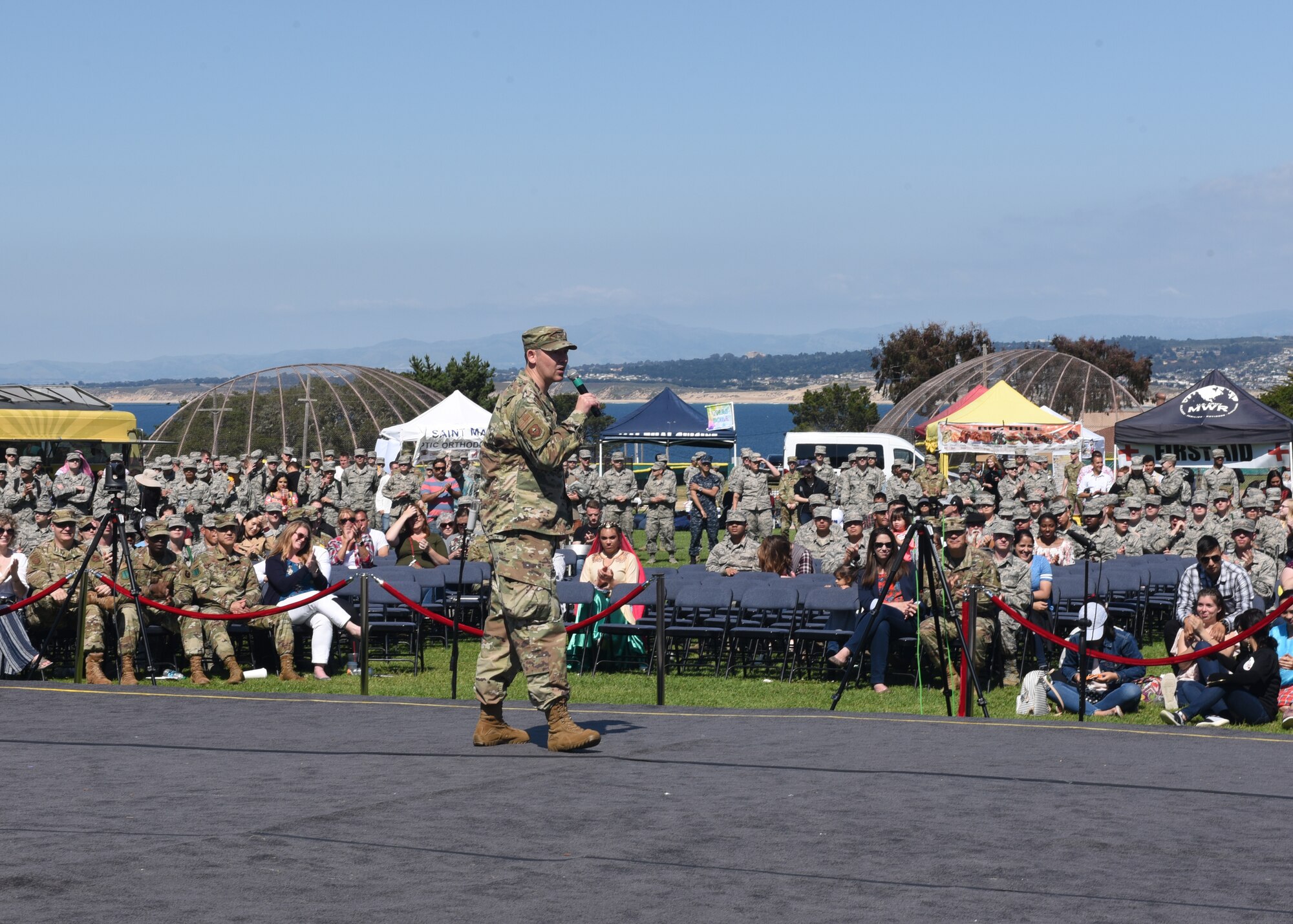 U.S. Air Force Col. Wiley Barnes, 517th Training Group commander, speaks to the over 6,000 guests in attendance of Language Day at Presidio of Monterey, Calif., May 10, 2019. Language Day is a display of the linguist and their understanding of the culture that they are learning about, it was said during the event that you can’t know a language if you do not know its culture. (U.S. Air Force photo by Airman 1st Class Zachary Chapman/Released)