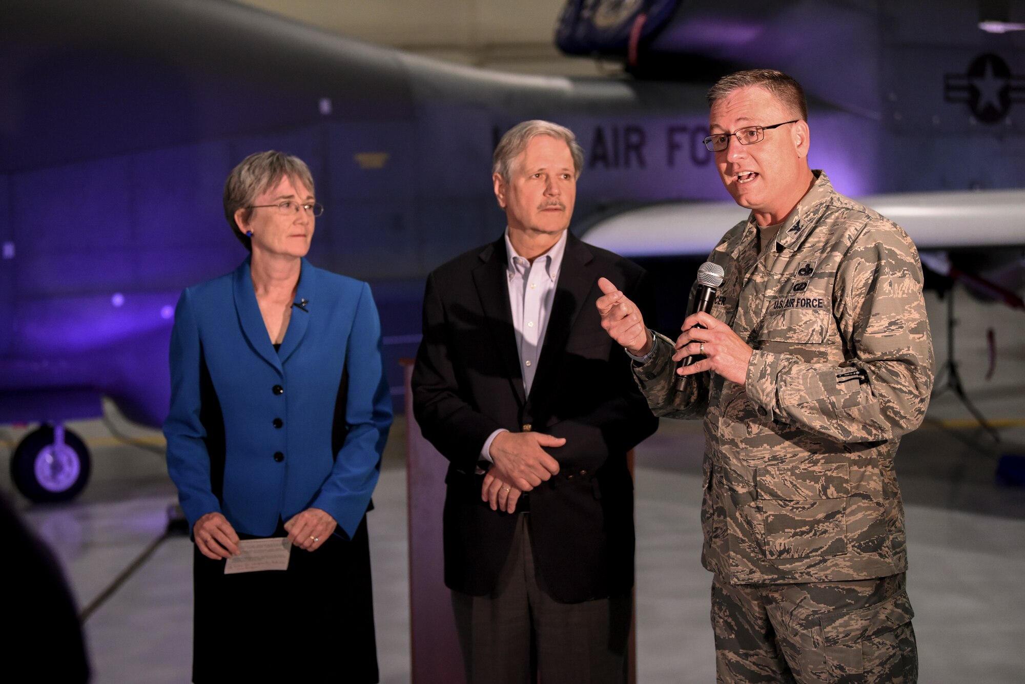 Colonel Benjamin Spencer, 319th Air Base Wing commander, answered questions alongside Heather Wilson, Secretary of the Air Force and John Hoeven, U.S. Senator of North Dakota about the future of the RQ-4 Global Hawk mission during the announcement of the upcoming re-designation to the 319th Reconnaissance Wing May 11, 2019 at Grand Forks Air Force Base, North Dakota. The official re-designation ceremony is scheduled for June 28, 2019, the effective date of re-designation. (U.S. Air Force photo by Staff Sergeant Michael Reeves Jr.)